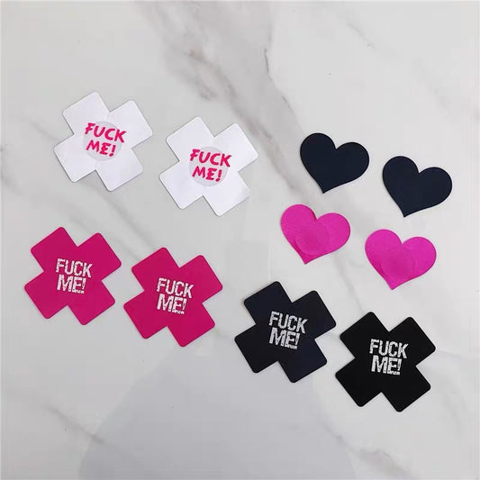Adult products Sexy milk stickers Heart-shaped sequins Cross chest stickers Sexy milk jewelry props Sexy milk stickers are in stock.